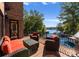 Entertain on this outdoor deck with ample seating, lake views, and an outdoor grill at 1220 Broadside Rd, York, SC 29745