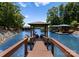 Walk down to your private covered dock on a beautiful lake setting at 1220 Broadside Rd, York, SC 29745