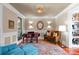 Cozy living room with a piano, stylish furniture, and a beautiful rug creating a comfortable ambiance at 1220 Broadside Rd, York, SC 29745