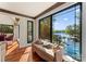 Cozy sitting area with large windows offering stunning lake views and natural light at 1220 Broadside Rd, York, SC 29745