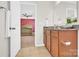 En-suite bathroom features a granite countertop vanity and neutral tile flooring at 12852 Mustang Dr, Midland, NC 28107