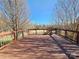 Backyard deck with wooden planks overlooking the green yard and beautiful blue skies at 159 S Gibbs Rd, Mooresville, NC 28117