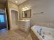Neutral bathroom featuring tile floors, a shower, and a soaking tub at 159 S Gibbs Rd, Mooresville, NC 28117