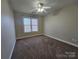 Bedroom featuring carpet floors and a window at 159 S Gibbs Rd, Mooresville, NC 28117