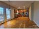 Spacious eat-in kitchen featuring stainless steel appliances, granite countertops, and hardwood floors at 159 S Gibbs Rd, Mooresville, NC 28117