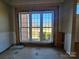 A partially renovated window provides natural light and outdoor views at 159 S Gibbs Rd, Mooresville, NC 28117