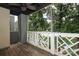 Spacious balcony featuring wood floors, decorative railing, and a beautiful view of the lake at 20115 Henderson Rd # D, Cornelius, NC 28031