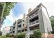 Apartment with a balcony and green exterior at 20115 Henderson Rd # D, Cornelius, NC 28031