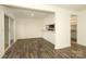 Spacious living room features a breakfast bar, microwave, and wood floors at 20115 Henderson Rd # D, Cornelius, NC 28031