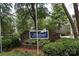 Windward Private Community entrance sign with lush greenery in a beautiful outdoor setting at 20115 Henderson Rd # D, Cornelius, NC 28031
