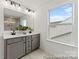 Modern bathroom with double sinks and a window at 205 Tillery Ln # 759, Mount Gilead, NC 27306