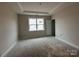 Spacious bedroom with window and door to bathroom at 2210 Camber Dr # Cwo0075, Gastonia, NC 28054