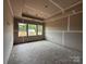 Bedroom with a large window and drywall ready for paint at 2210 Camber Dr # Cwo0075, Gastonia, NC 28054