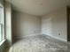 Unfinished bedroom with closet and window at 2210 Camber Dr # Cwo0075, Gastonia, NC 28054