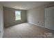 Unfinished bedroom features a window and a door at 2210 Camber Dr # Cwo0075, Gastonia, NC 28054