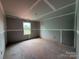 Unfinished bedroom with a window showing a partially wooded view at 2210 Camber Dr # Cwo0075, Gastonia, NC 28054