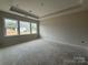 Bright bedroom with a large window and door to bathroom at 2210 Camber Dr # Cwo0075, Gastonia, NC 28054
