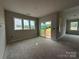 Bright bedroom with sliding glass doors and multiple windows, providing ample natural light at 2210 Camber Dr # Cwo0075, Gastonia, NC 28054