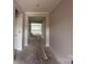Bright hallway with neutral walls and trim, leading to various rooms in the home at 2210 Camber Dr # Cwo0075, Gastonia, NC 28054