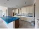Bright kitchen with white cabinets, a center island and potential space for modern appliances at 2210 Camber Dr # Cwo0075, Gastonia, NC 28054