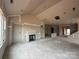 Living room under construction with a fireplace, bare walls and floors at 2210 Camber Dr # Cwo0075, Gastonia, NC 28054