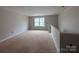 Unfinished room features a window and half wall at 2210 Camber Dr # Cwo0075, Gastonia, NC 28054