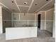 Unfinished kitchen with an island. 