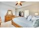 Beautiful main bedroom featuring tray ceiling, carpet, antique dressers and a walk-in closet at 2314 Talon Point Cir, Fort Mill, SC 29715