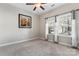 Neutral bedroom with plush carpeting, two windows, and a decorative painting at 2439 Bergamot St, Fort Mill, SC 29708