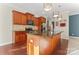Well-equipped kitchen with granite counters, stainless appliances, and sleek lighting fixtures at 2439 Bergamot St, Fort Mill, SC 29708