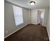 Comfortable bedroom featuring neutral walls, carpet, and a large window, creating a bright and relaxing space at 2507 Florida Ave, Kannapolis, NC 28083