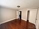 Simple bedroom featuring hardwood floors, closet, neutral walls, and classic trim, great for a personalized touch at 2507 Florida Ave, Kannapolis, NC 28083