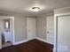 Bedroom showcasing hardwood floors and several doors at 2507 Florida Ave, Kannapolis, NC 28083
