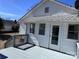 Exterior view of home with a gray painted deck and access to the backyard at 2507 Florida Ave, Kannapolis, NC 28083