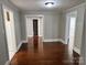 Living room featuring hardwood floors and doorways to other rooms at 2507 Florida Ave, Kannapolis, NC 28083