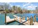 A private dock on the lake, perfect for boating and enjoying waterfront activities with scenic views at 353 Whippoorwill Rd, Mooresville, NC 28117