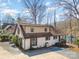 Charming two-story home with neutral siding, brown roof, and well-maintained landscaping at 353 Whippoorwill Rd, Mooresville, NC 28117