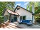Charming home with a white brick exterior and a deck that adds outdoor living space with comfortable seating at 353 Whippoorwill Rd, Mooresville, NC 28117