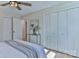 Bedroom showcasing a large closet, sleek floors, and lots of natural light at 3617 12Th Street Ne Dr, Hickory, NC 28601