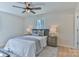 Bedroom with a comfortable bed, a ceiling fan, and hardwood floors at 3617 12Th Street Ne Dr, Hickory, NC 28601