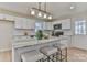 Bright kitchen boasts stainless appliances, granite counters, and a large island with seating at 3617 12Th Street Ne Dr, Hickory, NC 28601