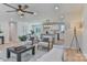 Living room with kitchen, hardwood floors, recessed lighting and a ceiling fan at 3617 12Th Street Ne Dr, Hickory, NC 28601