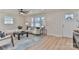 Bright living room with hardwood floors, large windows, neutral paint and stylish furnishings at 3617 12Th Street Ne Dr, Hickory, NC 28601
