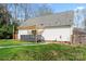 Yard featuring a cozy deck with cover and a fire pit, all next to the home, blending indoor with outdoor living at 4053 Crestview Dr, Rock Hill, SC 29732