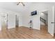 Spacious bedroom featuring wood-look flooring and entries to a bathroom and closet at 4053 Crestview Dr, Rock Hill, SC 29732