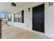 Front porch with white siding, black shutters, and black front door at 4053 Crestview Dr, Rock Hill, SC 29732