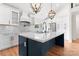 Bright kitchen with a central island, ample cabinet space, and modern stainless steel appliances at 4053 Crestview Dr, Rock Hill, SC 29732