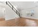 View of the bright and airy living room featuring hardwood floors, modern staircase, and ample natural light at 4053 Crestview Dr, Rock Hill, SC 29732