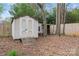 Backyard shed offers extra storage, situated in a wooded area of the property at 4053 Crestview Dr, Rock Hill, SC 29732