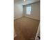 A bright bedroom featuring neutral carpet and a window providing ample natural light at 4116 Lurelin Ln, Charlotte, NC 28262